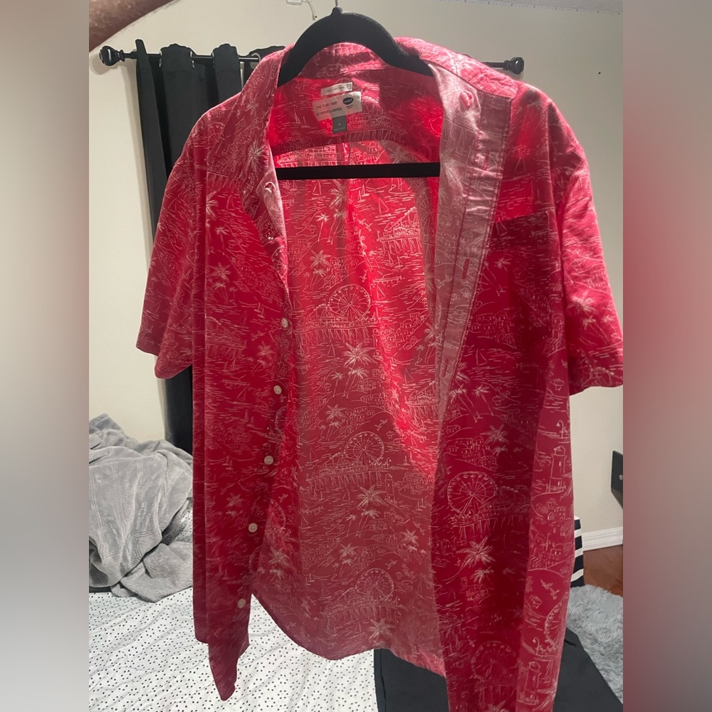 Red old navy button down shirt with designs printed on it